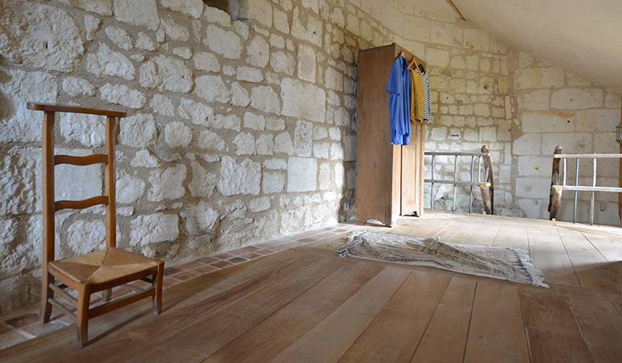 Des anciennes échelles ont servi à réaliser la balustrade de l'escalier.