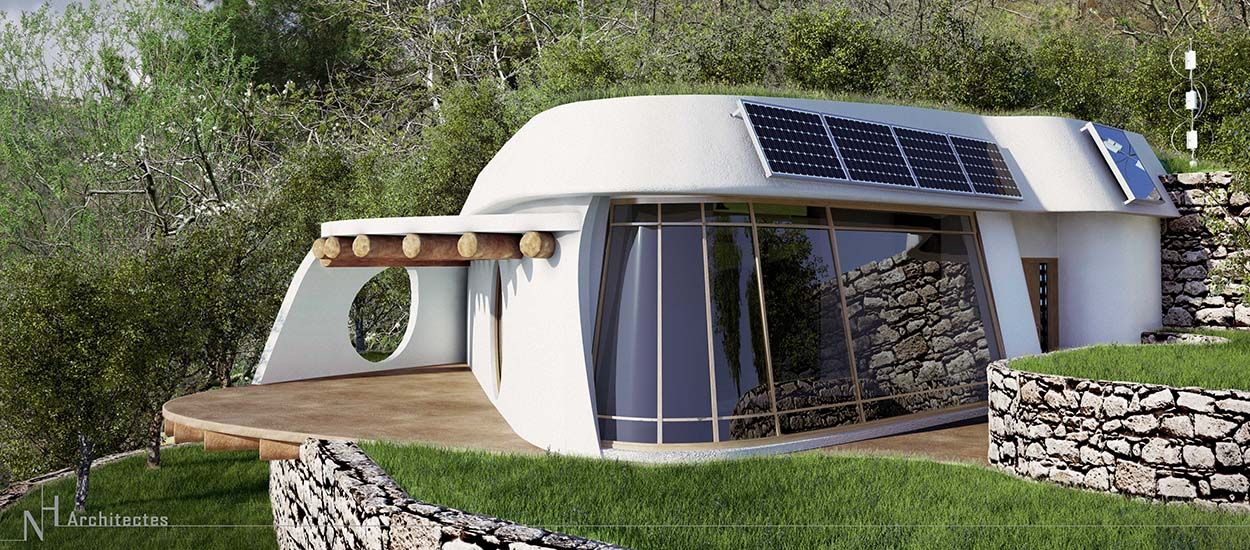 Ces jolies petites maisons écolo sont des Earthships modernes qui luttent contre la crise des déchets