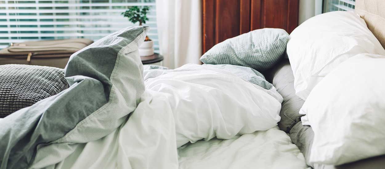 Comment enfiler une housse de couette sans tout casser ? 4 techniques infaillibles